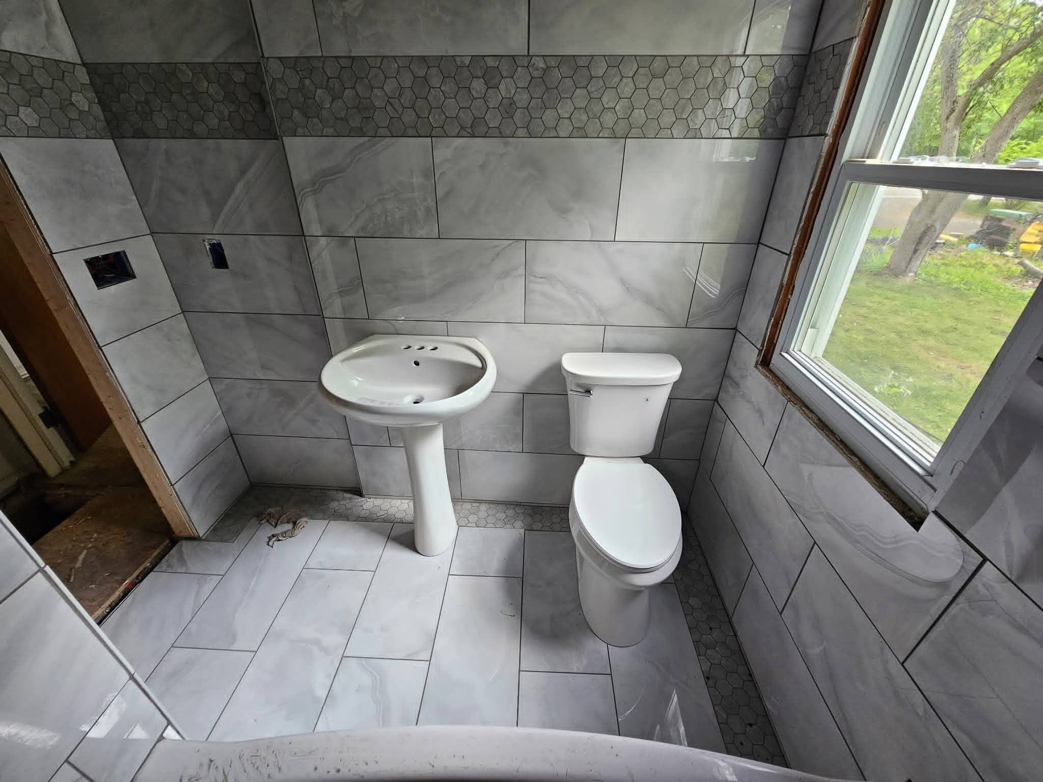 Completed bathroom remodels project by TreeLife